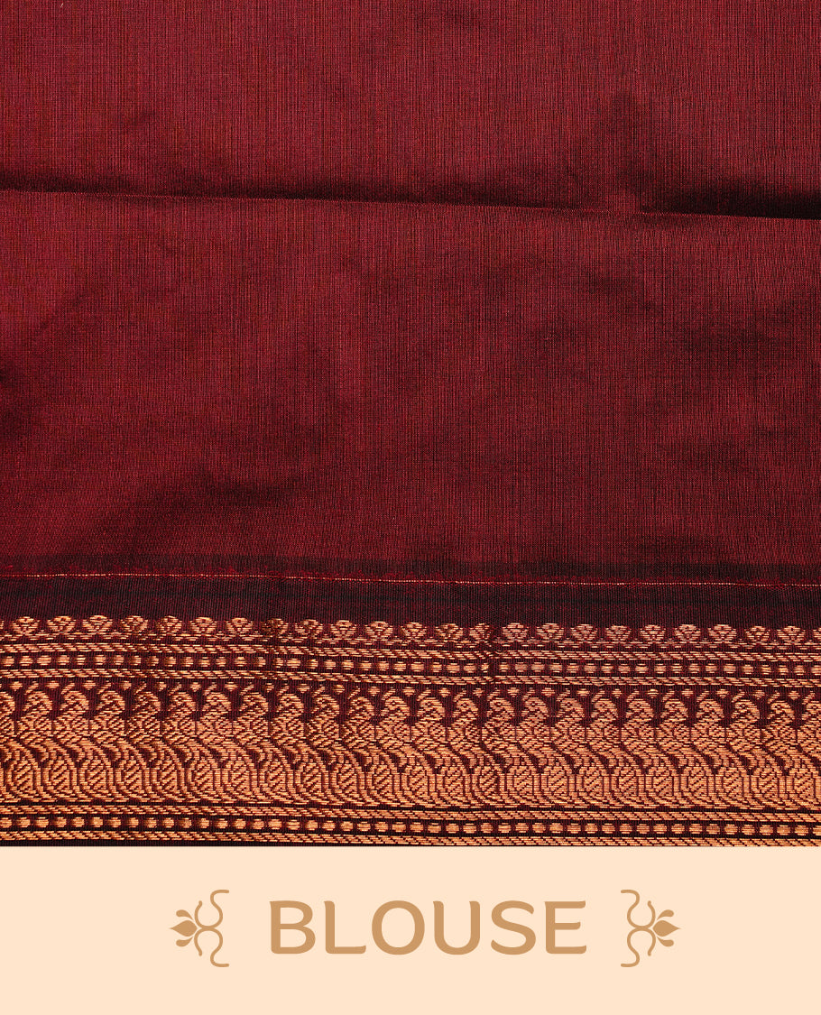 Pista green colour kalyani cotton saree featuring gold zari motifs on body, highlighting contrast Maroon colour with Antique gold zari border, paired with matching blouse piece.