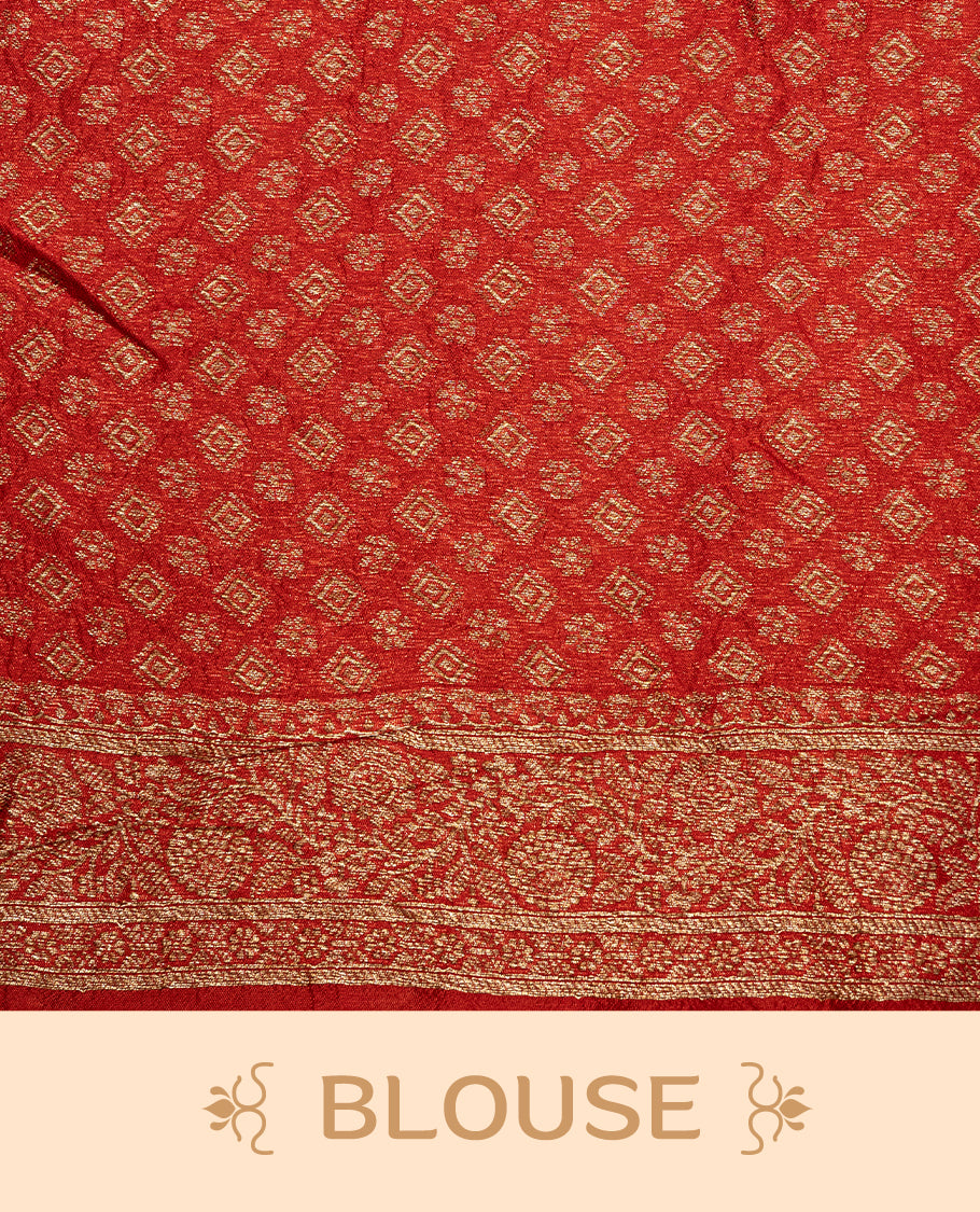 Red colour Semi banaras tussar georgette Saree featuring Antique zari motifs on body, enhanced with antique zari border, paired with a matching blouse piece.