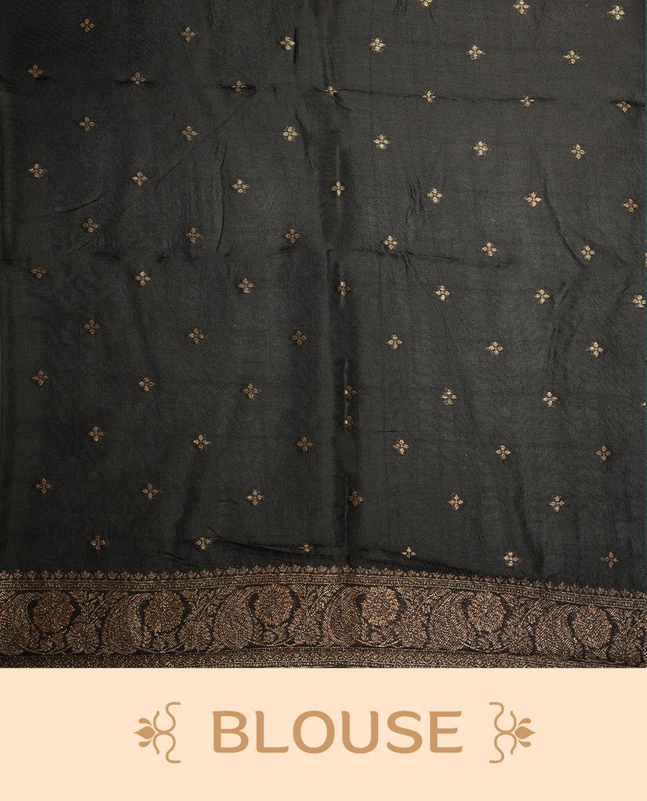 Black colour semi Banarasi Tussar Georgette saree with gold zari motifs on the body, a grand woven golden pallu, and ornate zari border, Includes a matching blouse piece for a complete look.