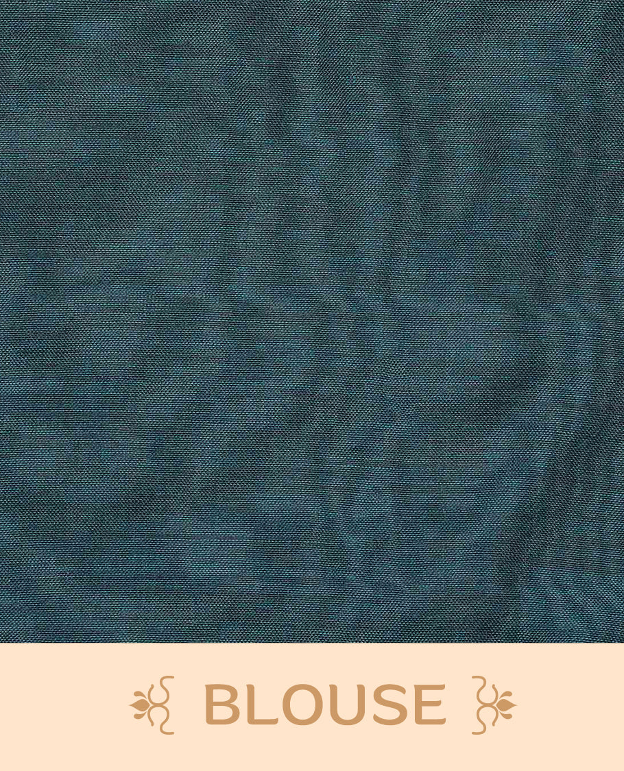 Peacock blue and wine coloured half and half mul cotton saree featuring elegant sequin detailing on the body, finished with a beautiful pallu adorned with tassels.