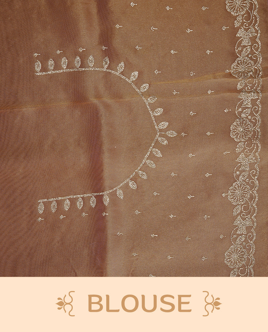 Pinkish orange colour designer saree featuring stone worked body, stone worked border, paired with matching blouse piece.