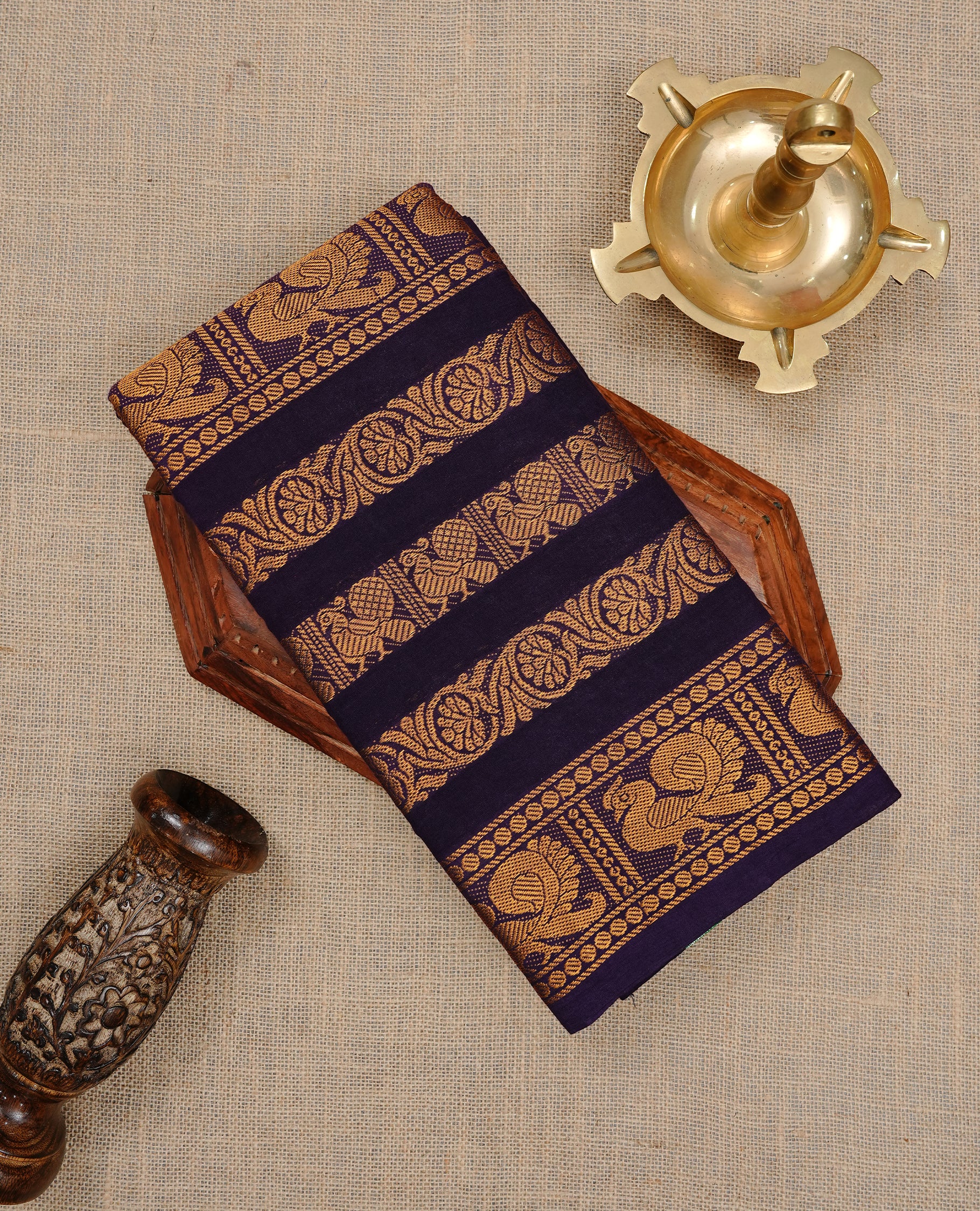 Dark Blue colour sungudi cotton saree featuring elegant plain body, complemented by Traditional border on self color , paired with matching blouse piece.
