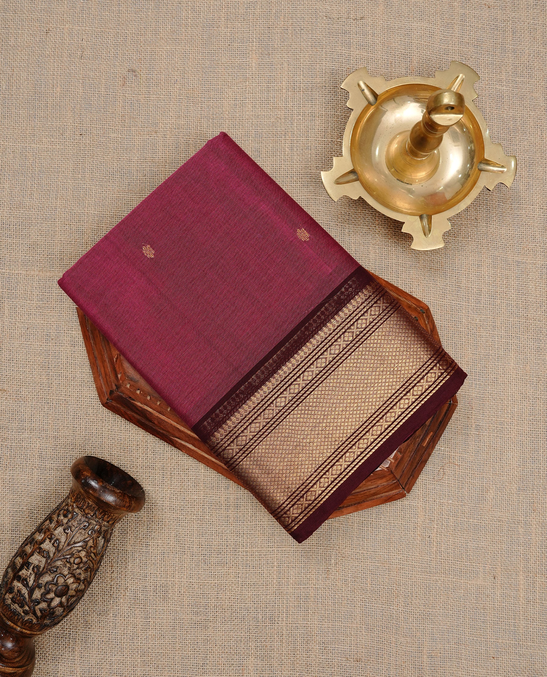Mauve colour Chettinad cotton saree featuring Gold zari motifs body, complemented by contrast Chocolate Brown colour with gold zari border, paired with matching blouse piece.