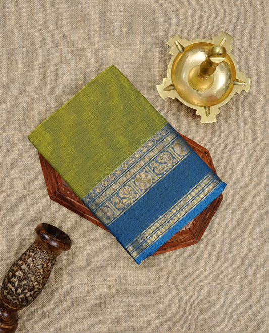 Lemon Green colour Chettinad cotton saree featuring Elegant plain body, complemented by contrast Blue colour with gold zari border, paired with matching blouse piece.