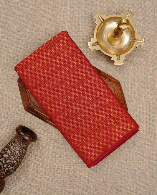 Maroon colour Sungudi cotton saree featuring Gold zari Stripes on body, Gold Small check zari on Self colour border, paired with matching blouse piece.