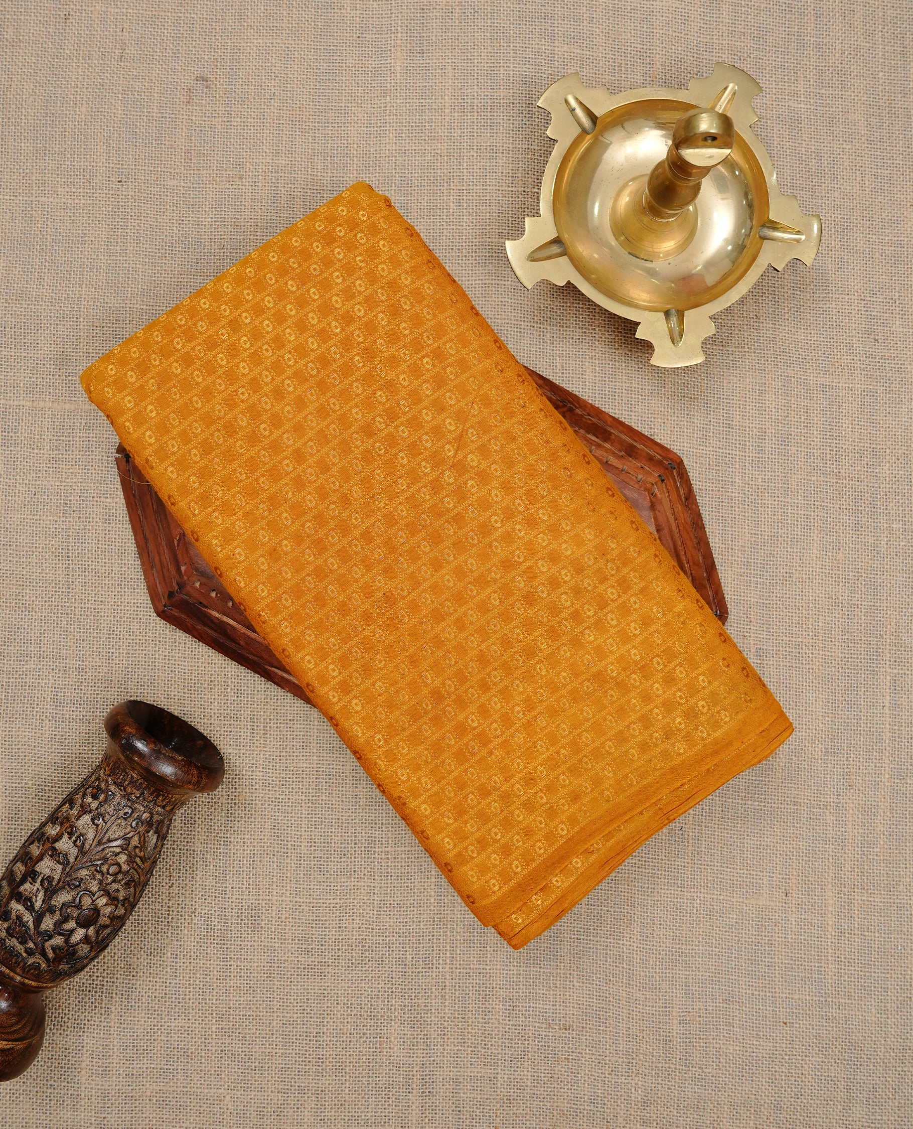 Mustard colour Sungudi cotton saree featuring Gold zari Stripes on body, Gold Small check zari on Self colour border, paired with matching blouse piece.