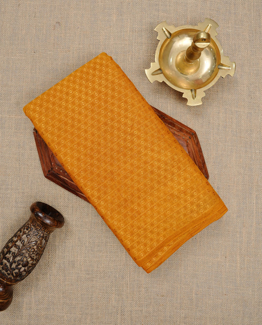 Mustard colour Sungudi cotton saree featuring Gold zari Stripes on body, Gold Small check zari on Self colour border, paired with matching blouse piece.