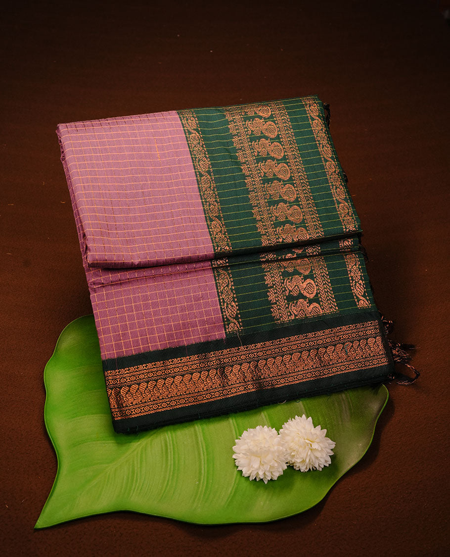 Lavender colour kalyani cotton saree featuring gold zari check pattern on body, complemented by green colour with Antique zari border, paired with matching blouse piece.