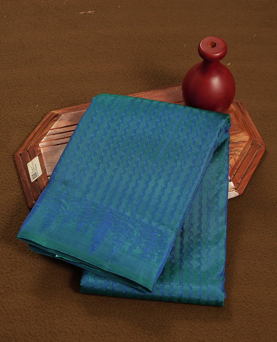 Peacock Blue Colour Semi Soft Silk Saree Featuring a Self Coloured Patterned Body, Complemented by Self Coloured Pallu & Border and a Matching Blouse Piece