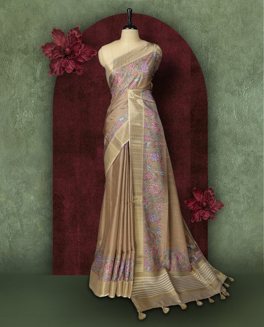 Beige colour Semi Tussar Silk saree with vibrant digital floral printed body and elegant Kandha work border & Paired with a matching blouse.