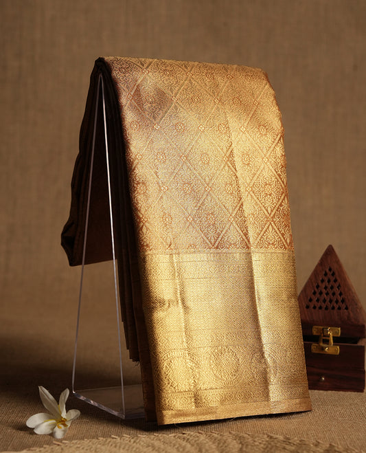 Golden colour and gold Zari Tissue Brocade Saree features intricate Dimond floral Motifs on body and self coloured border & pallu, paired with matching blouse