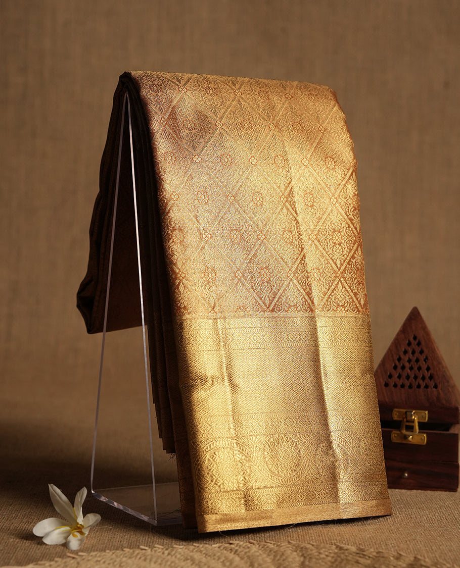 Golden colour and gold Zari Tissue Brocade Saree features intricate Dimond floral Motifs on body and self coloured border & pallu, paired with matching blouse