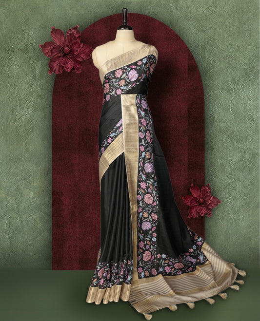 Black colour Semi Tussar Silk saree with vibrant digital floral printed body and elegant Kandha work border & Paired with a matching blouse.