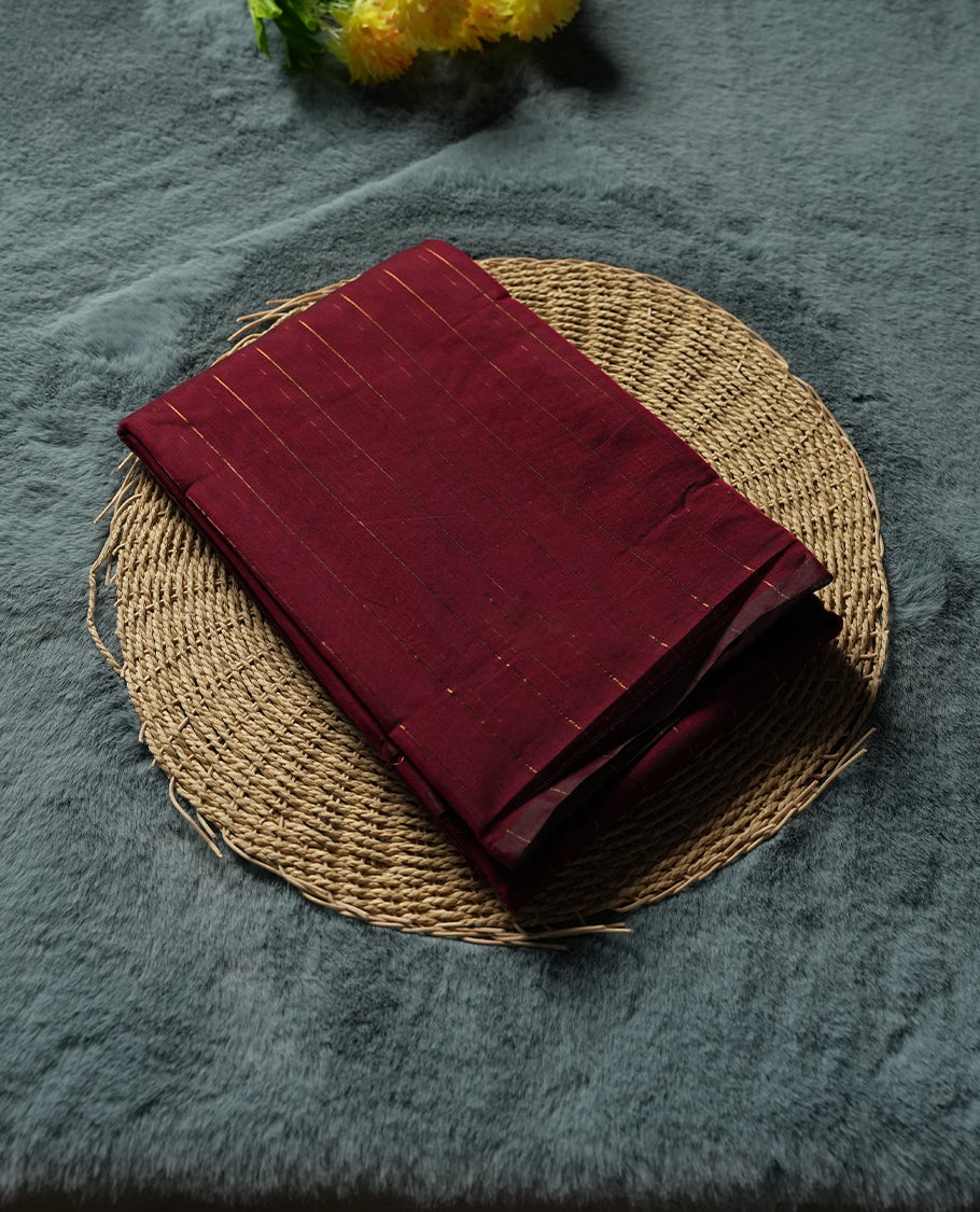 Burgundy Silk Cotton Saree with Red Zari Striped Body, Accented by Pink and Blue Striped Zari Border on Red Pallu, Paired with Matching Blouse Piece