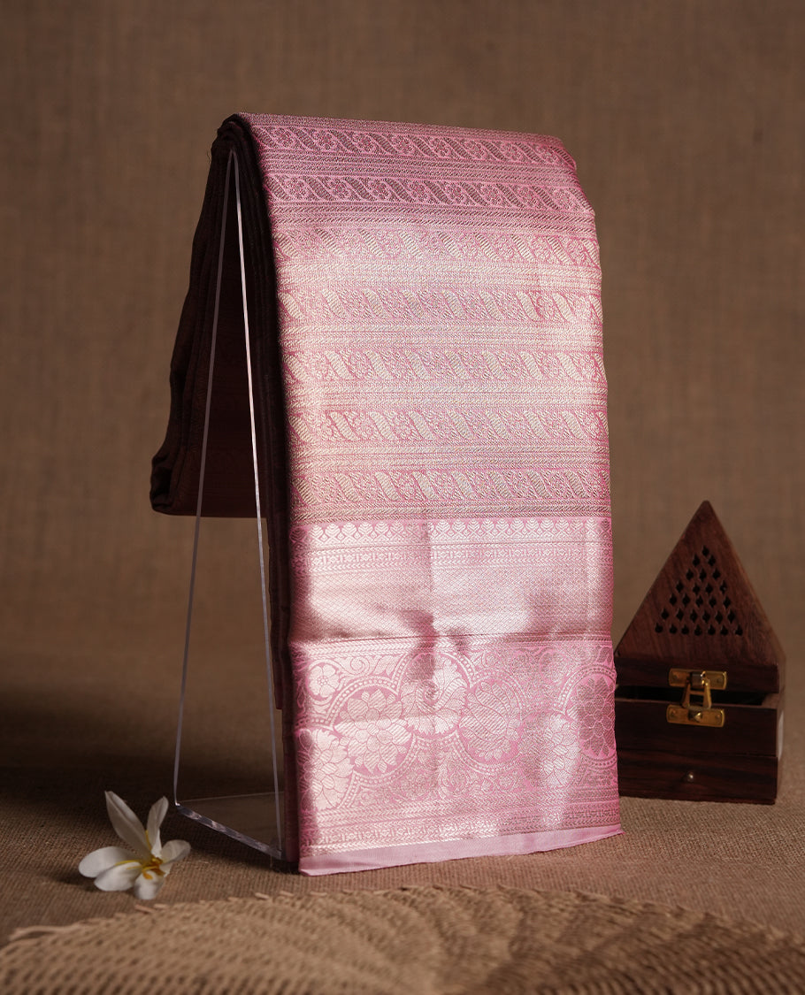 Light pink colour and gold Zari Tissue Brocade Saree features intricate Motifs on body and rose gold colour traditional border & pallu, paired with matching blouse