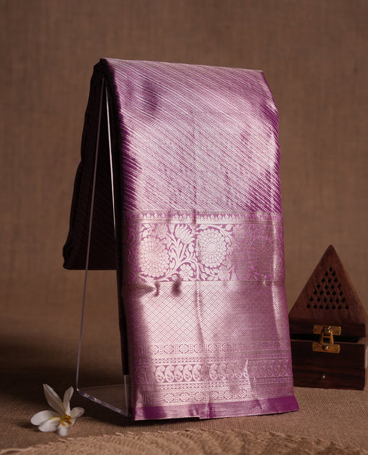 Neon Purple colour and rose gold Zari Tissue Brocade Saree features intricate line Motifs on body and self coloured border & pallu, paired with matching blouse