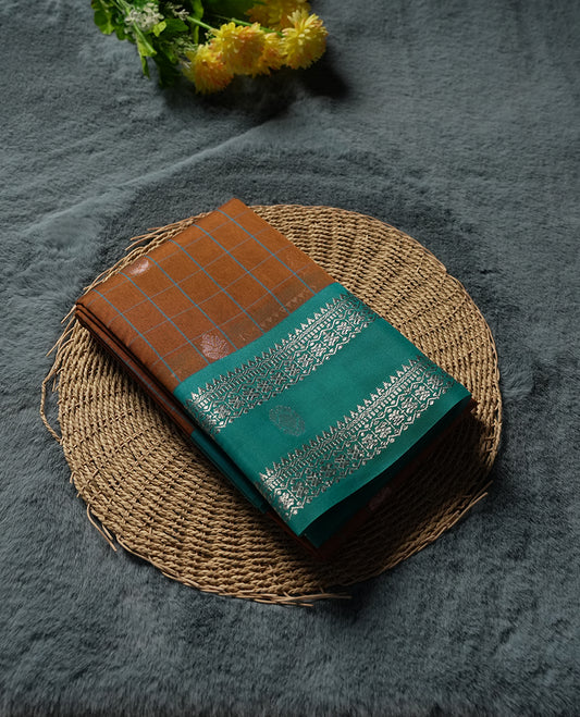 Orange Silk Cotton Saree with White Floral Buttas Body, Accented by White Lotus and Geometric Pattern on Green and Blue Zari Pallu, Paired with Matching Blouse Piece