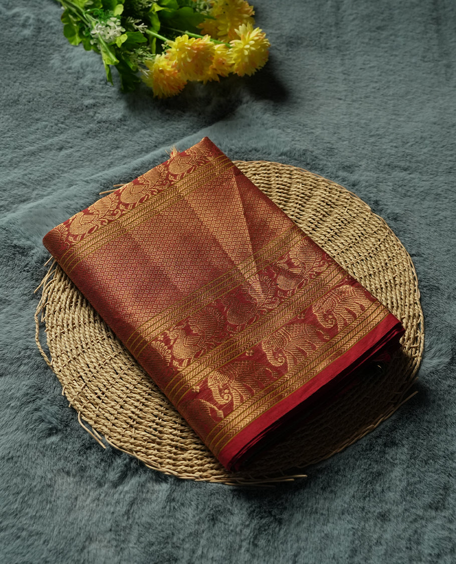 Beige Gold colour Silk Cotton Saree with Contrast Red Zari Border Featuring Elephant and Peacock Motifs, Subtle Allover Body, Richly Patterned Blouse Piece, and Matching Elegant Pallu with Gold Stripes