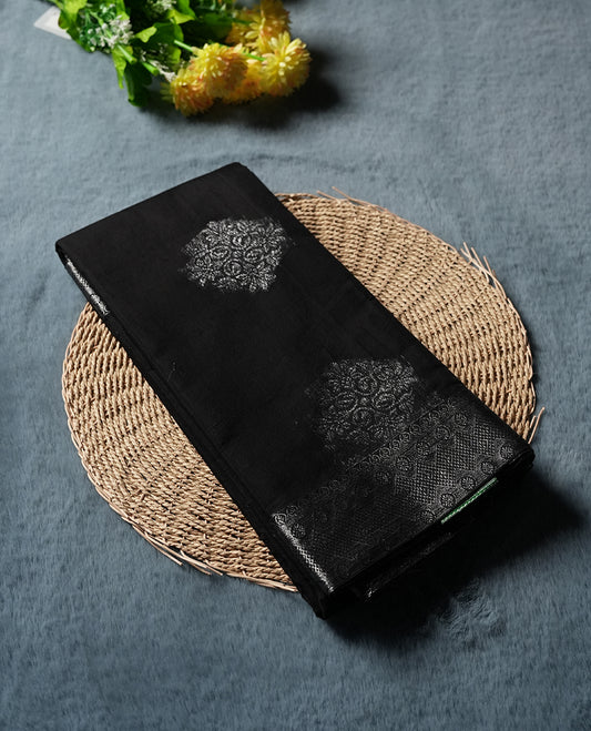 Black Cotton Saree with Silver Zari Textured Circular/Medallion Butta Body, Featuring Elaborate Zari-Woven Pallu with Multi-Layered Ornamental Border Patterns and Fine Geometric Details, Paired with Matching Gray Woven Textured Plain Blouse Piece