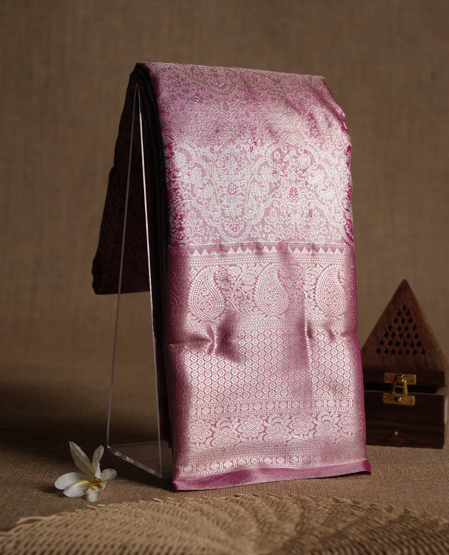 Pink colour and rose gold Zari Tissue Brocade Saree features intricate floral Motifs on body and self coloured border and traditional pallu, paired with matching blouse