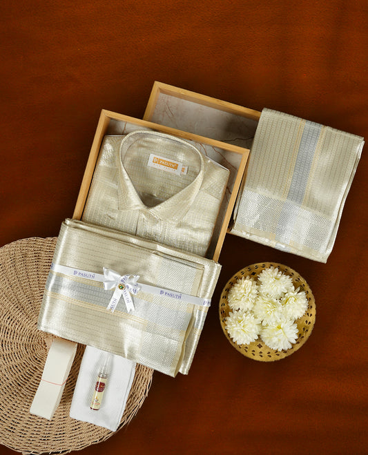Elegant Silver Gold shirt & dhoti set by PASUTHI, crafted with rich silk blend fabric and zari detailing, Perfect for weddings, poojas & gifting. Comes with towel, attar & vibhuti in a premium gift box.
