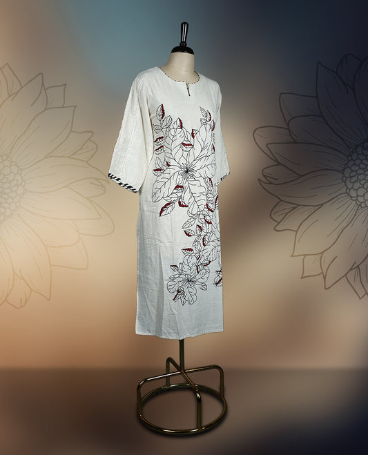 Off white colour kurthi with bold black floral prints and dark maroon accents, featuring three quarter sleeves with contrast edging & Perfect for casual or semi formal wear, pairs beautifully with leggings or palazzos.