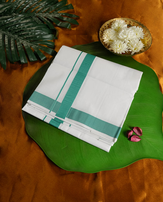 White colour cotton dhoti with a striking aqua green border, combining simplicity with a refreshing touch of tradition & Perfect for cultural events, temple wear, and festive celebrations.