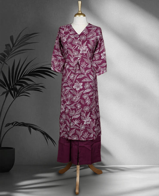 Onion pink colour cord set featuring a floral printed top with a V neck and button detailing, paired with solid onion pink pants.