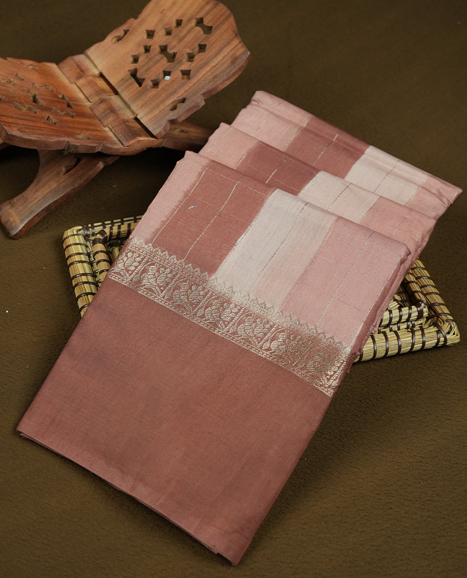 Muted brown chanderi cotton saree with checkered striped body, brown pallu featuring silver zari border, and matching checkered blouse.