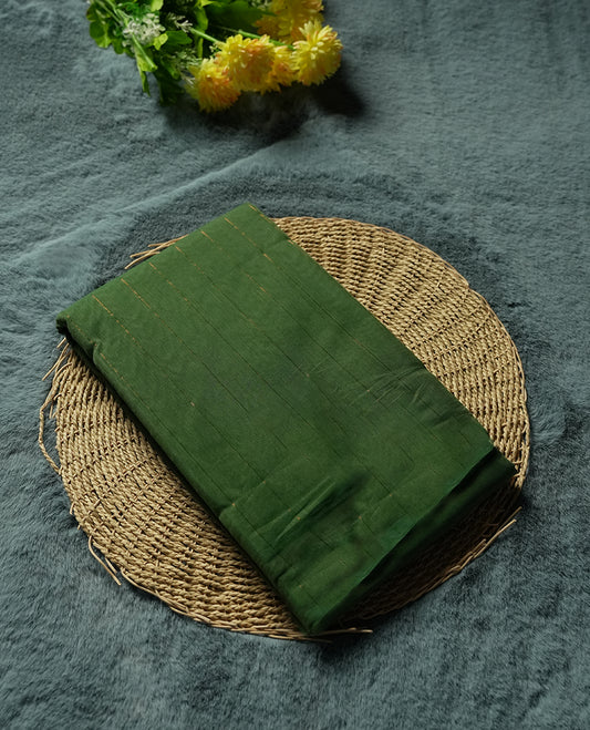 Bottle Green Colour silk cotton saree with fine gold pinstripes on the body, multitone rust-red striped pallu, and a plain rust-red blouse with a slim green edge