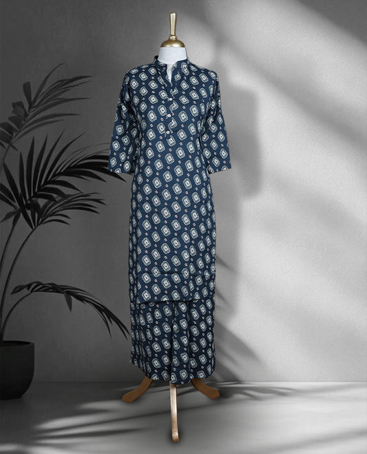 Pantone blue colour cord set featuring an all over white block print kurta with a mandarin collar and button placket, paired with matching printed palazzo.