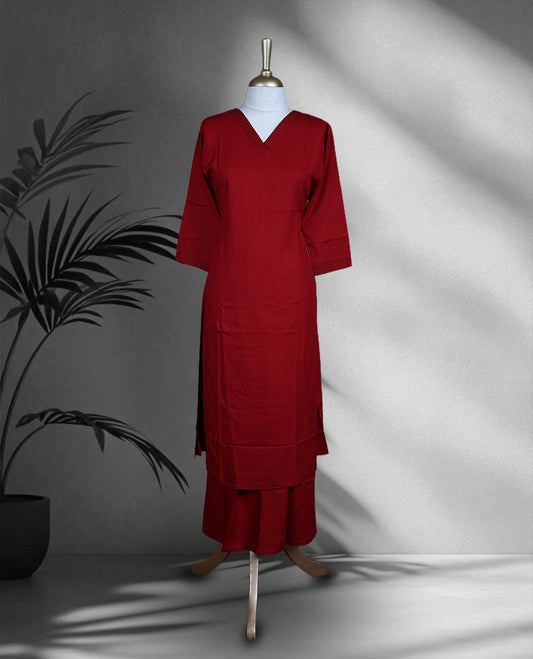 Maroon colour cord set featuring a plain V neck kurta with subtle stitch detailing on neckline and sleeves, paired with matching palazzo.