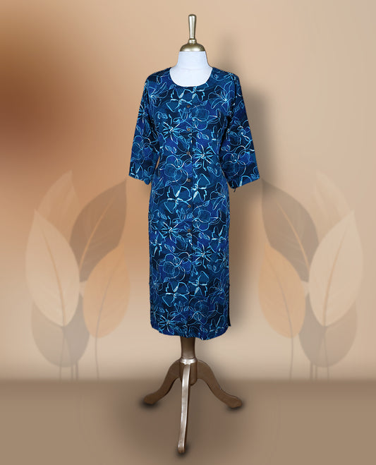Navy blue colour kurthi adorned with delicate floral prints, featuring a round neckline and three quarter sleeves & Crafted for comfort and style, perfect for casual and semi formal occasions.