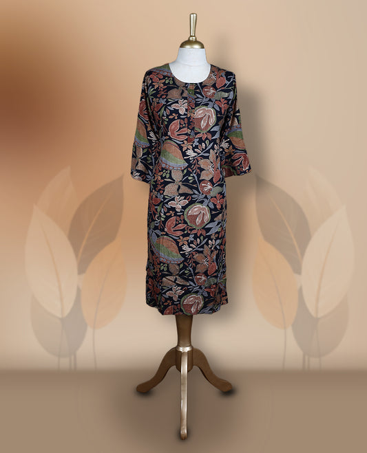 Navy blue colour kurti featuring a round neckline, 3/4th flared sleeves, and an all over floral print in green and beige hues, designed with a straight cut silhouette for a chic casual look.
