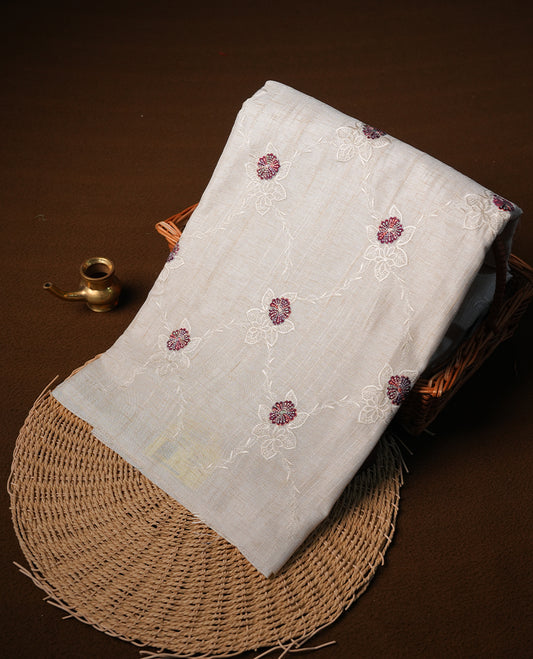 Cream colour semi tuseer silk saree featuring with Self colour thread embroidery kodi pattern & brown colour floral thread motifs all over body, pallu, and paired with matching blouse piece.