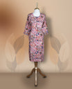 Pink colour kurthi adorned with delicate cream & navy blue colour floral prints, featuring a round neckline and three quarter sleeves & Crafted for comfort and style, perfect for casual and semi formal occasions.