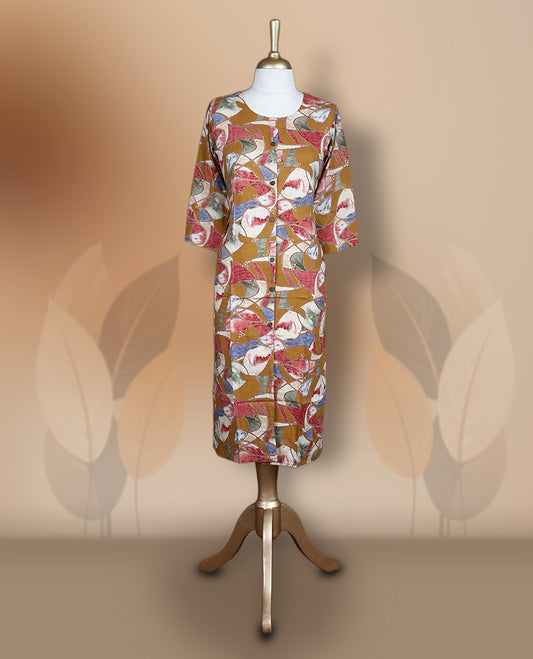 Mustard colour kurthi adorned with delicate floral prints, featuring a round neckline and three quarter sleeves & Crafted for comfort and style, perfect for casual and semi formal occasions.