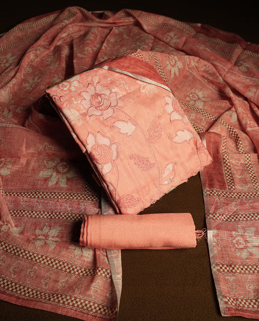 Peach colour churidhar material featuring cutwork and thread embroidery on the front panel, floral digital printed dupatta with elegant border, and matching plain bottom.
