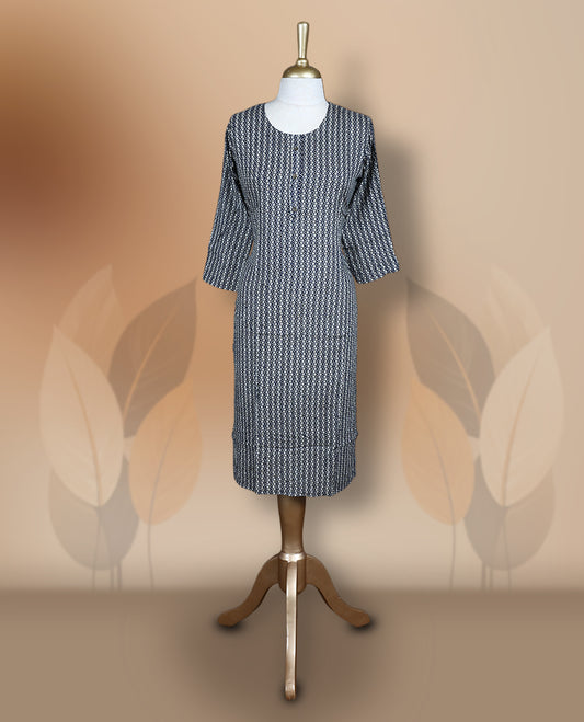 Navy blue colour kurthi adorned with delicate cream colour floral prints, featuring a round neckline and three quarter sleeves & Crafted for comfort and style, perfect for casual and semi formal occasions.