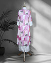 Pink and off white colour cord set featuring a geometric printed kurta with button-down front and lace detailed sleeves, paired with plain off white palazzo.