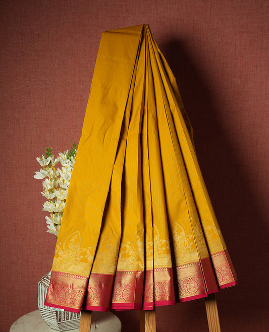Yellow Colour Semi Silk Saree with Golden Striped Body, Contrasting Pink Golden Zari Pallu & Border, Paisley Motifs, and Matching Blouse Piece