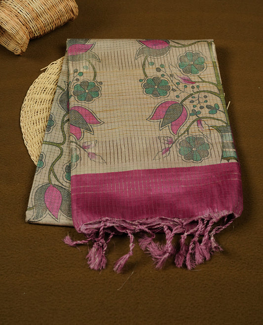 Wheat colour semi tussar silk saree featuring floral print and zari check pattern across body, contrast Pink colour border and pallu, paired with matching blouse piece.