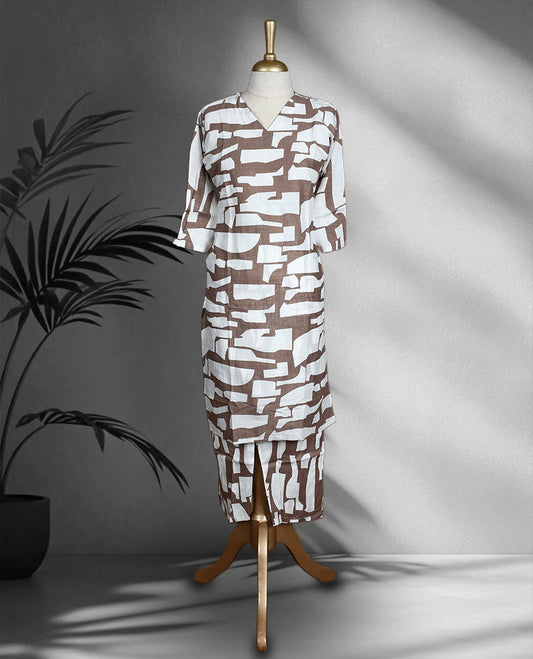 Saddle brown colour and white abstract print cord set featuring a V neck top with a front slit, paired with matching straight fit pants.