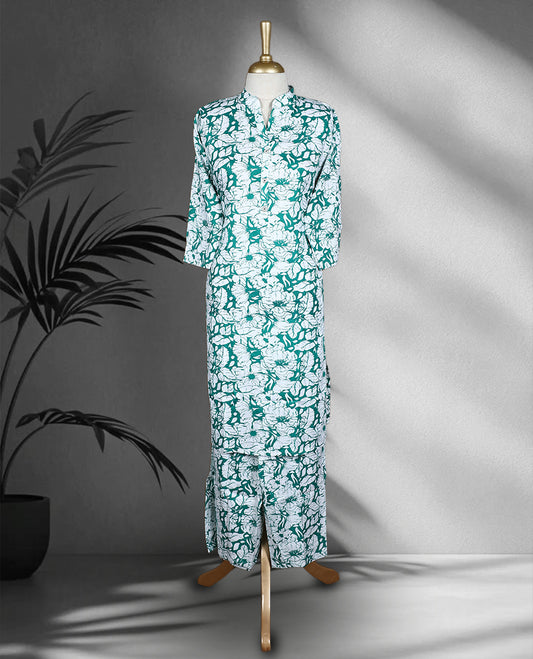 White and green colour cord set with bold floral prints, featuring a band collar top with front buttons and matching straight fit pants.