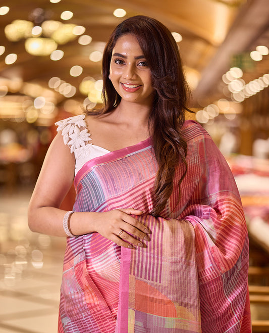 Pink colour abstract digital print saree featuring a unique border and printed pallu, paired with a matching blouse