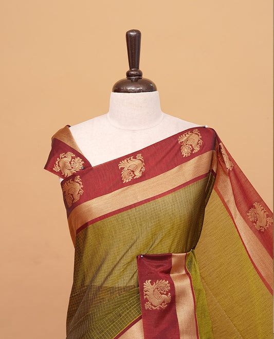 Olive Green colour silk cotton saree featuring  copper zari Check motifs on body ,contrast maroon with copper zari motifs on border & pallu, comes with matching blouse piece