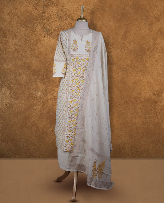 Ivory colour churidar set featuring thread embroidered on neckline, sleeves, and Yellow colour floral printed pattern on body , Paired with a matching dupatta