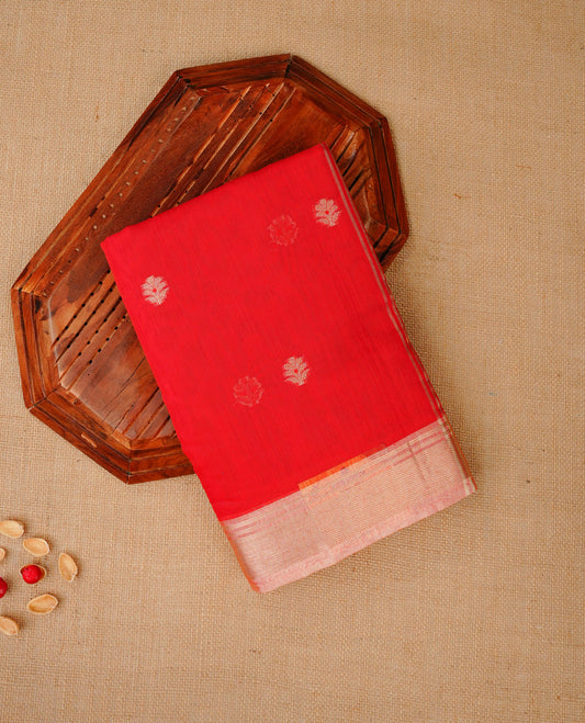 Red colour Maheshwari cotton saree, gold zari floral motifs on body, complement peach colour gold zari border comes with matching blouse.