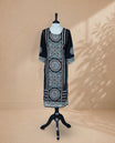Black Colour Kurti featuring bold Cream & Brown Digital Prints On body , a round neckline, and 3/4 sleeve Design