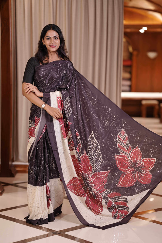 Black and Creme Masakali Saree with Flowers highlighted on Pallu with marble Design blouse